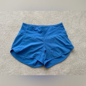Lululemon Women’s Mid Rise Speed Up Shorts, Size 4, 4” inseam.